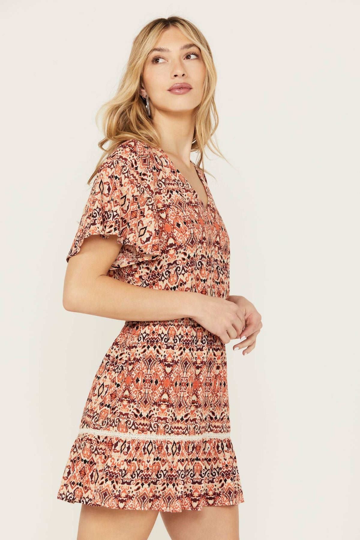 Blossom Flutter Sleeve Smocked Dress