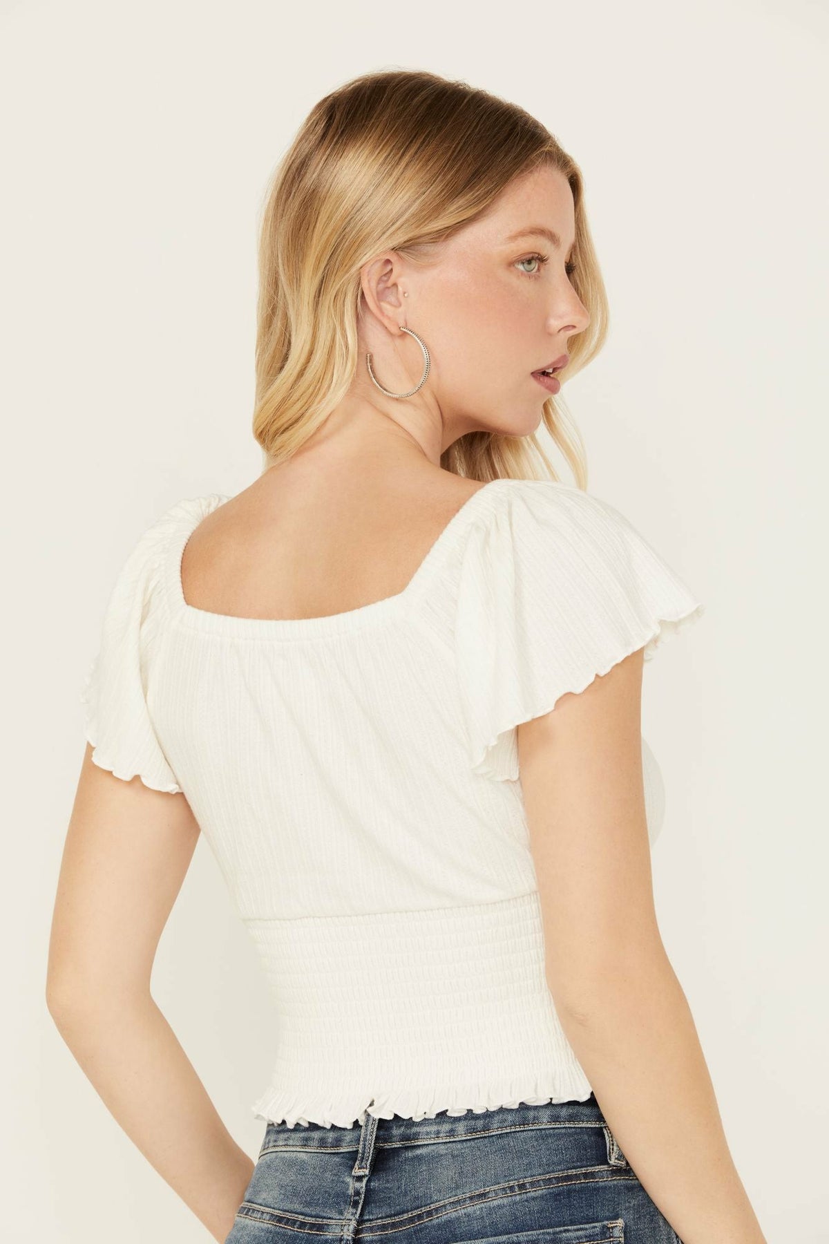 Pointe Flutter Sleeve Smocked Top